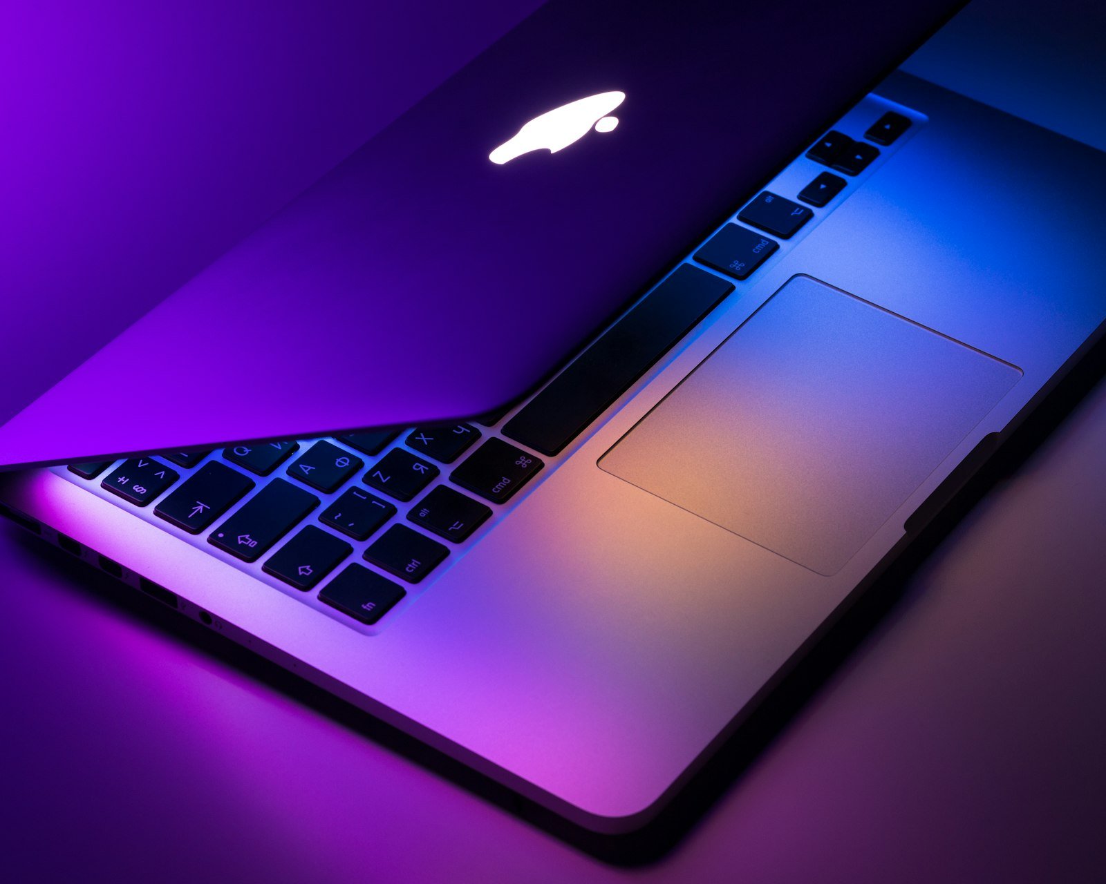 Developer comparing LLM quantization formats GGUF AWQ and GPTQ on a laptop